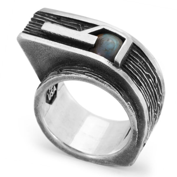 Gravity Ring — brutalist sterling silver statement ring set with a labradorite cabochon, from the Ether11 M31 collection, handmade in Los Angeles.